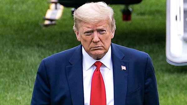 President Donald J. Trump disembarks Marine One Sunday, May 17, 2020, on the South Lawn of the White House, returning from his working weekend at Camp David near Thurmont, Maryland. (Official White House photo by Tia Dufour)