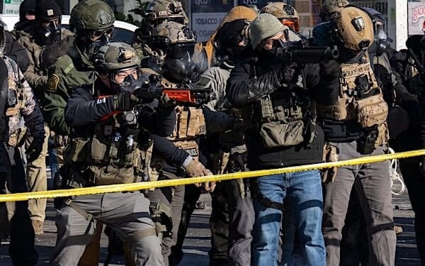 ICE and Border Patrol agents in Minneapolis on Saturday, Jan. 24, 2026, following the shooting death of anti-ICE activist Alex Pretti. (Photo by Chad Davis)