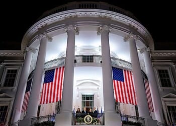 President Donald J. Trump, First Lady Melania Trump, Supreme Court Associate Justice Amy Coney Barrett, and her husband Jesse Barrett greet invited guests on the Blue Room Balcony of the White House Monday, Oct. 26, 2020, after attending Barrett's swearing-in ceremony as Supreme Court Associate Justice. (Official White House photo by Tia Dufour)