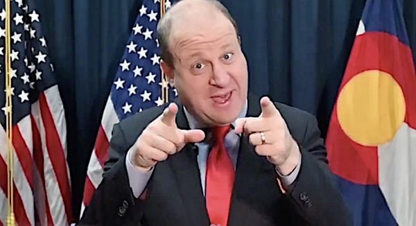 Gov. Jared Polis, D-Colo., performs his own rendition of 'Feliz Navidad' on Christmas Eve 2023 (Video screenshot)