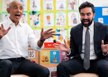 Barack Obama and Zohran Mamdani singing and moving their hands in a classroom