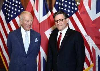 King Charles and Mike Johnson standing