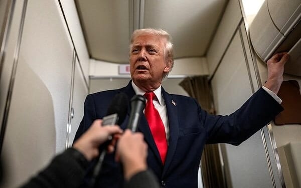 President Donald Trump answers questions from members of the media aboard Air Force One en route to Mount Pocono, Pennsylvania, for a rally on the economy, Tuesday, December. 9, 2025. (Official White House photo by Molly Riley)