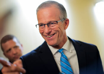 Senate Majority Leader John Thune speaks to reporters in the Capitol.