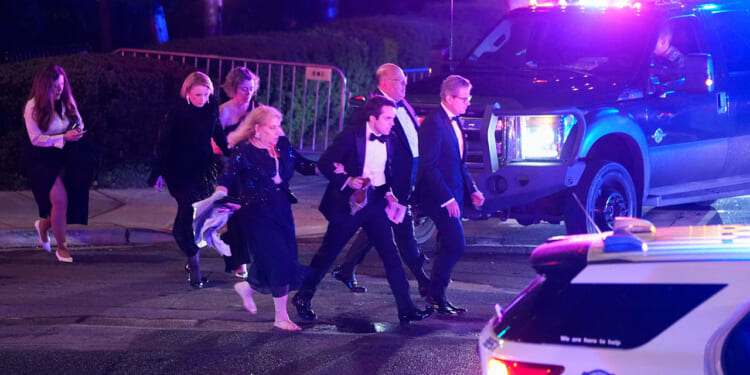 White House Correspondents Dinner attendees leave after shots fired.