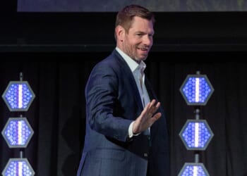 Eric Swalwell waving