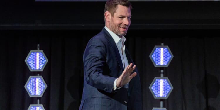 Eric Swalwell waving