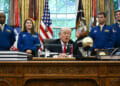 US President Donald Trump speaks as he welcomes the Artemis II astronauts, from L to R, Victor Glover, Christina Koch, Reid Wiseman and Jeremy Hansen in the Oval Office at the White House in Washington, DC, on April 29, 2026.