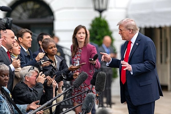 President Donald Trump departs the White House and gaggles with the press on the South Lawn before boarding HMX-1 to begin traveling to the United Kingdom on Tuesday, Sept. 15, 2025. (Official White House photo by Harrison Koeppel)