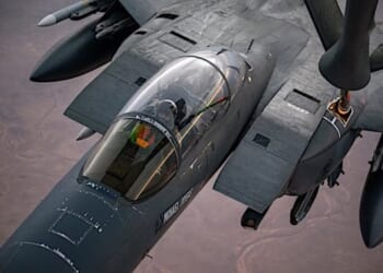 Airmen refuel an F-15E Strike Eagle over the U.S. Central Command area of responsibility, Thursday, Dec. 26, 2024. (U.S. Air Force photo by Senior Airman Zachary Willis)