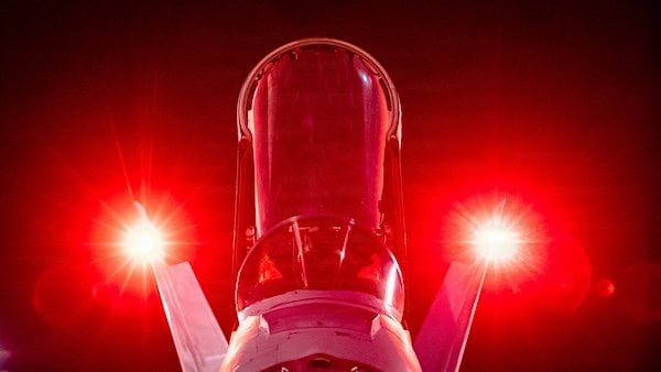 U.S. Navy sailors prepare aircraft for nighttime flight operations over the U.S. Central Command operating area in April 2026. (U.S. CENTCOM photo)