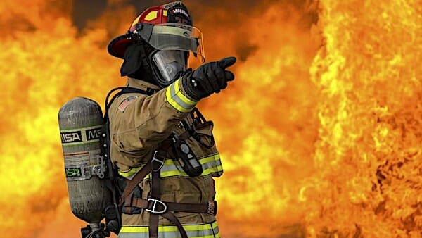 Air Force Tech. Sgt. Jordan Salas conducts a live-fire training burn at Andersen Air Force Base, Guam, Jan. 10, 2020. (Photo by U.S. Air Force Airman 1st Class Helena Owens)