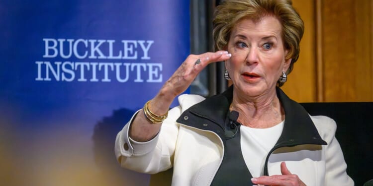 Education Secretary Linda McMahon seated