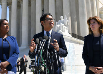 Then-ACLU's Voting Rights Project Director Dale Ho (C) flanked by New York Attorney General Letitia James (L) and Director of the Census for New York City Julie Menin (R) speaks to reporters outside of the US Supreme Court in Washington, DC on April 23, 2019. - In March 2018, US Secretary of Commerce Wilbur Ross announced he was going to reintroduce for the 2020 census a question on citizenship abandoned more than 60 years ago. The decision sparked an uproar among Democrats and defenders of migrants -- who have come under repeated attack from an administration that has made clamping down on illegal migration a hallmark as President Donald Trump seeks re-election in 2020. (Photo by MANDEL NGAN / AFP) (Photo credit should read MANDEL NGAN/AFP via Getty Images)