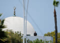 A police officer stands guard as emergency workers respond at the scene of a reported active shooter situation at the Islamic Center in San Diego, California, U.S., May 18, 2026. REUTERS/Mike Blake