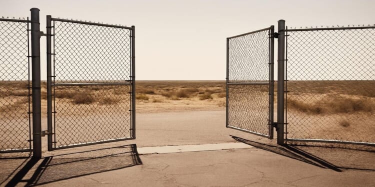 Detention gate Texas landscape