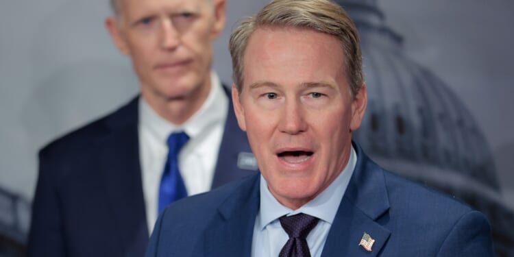 Sen. Jon Husted (R-OH) speaks to reporters during a news conference.