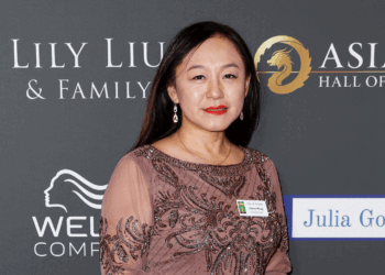 Eileen Wang, former mayor of Arcadia California stands and smiles at the 2023 Asian hall of fame induction ceremony.
