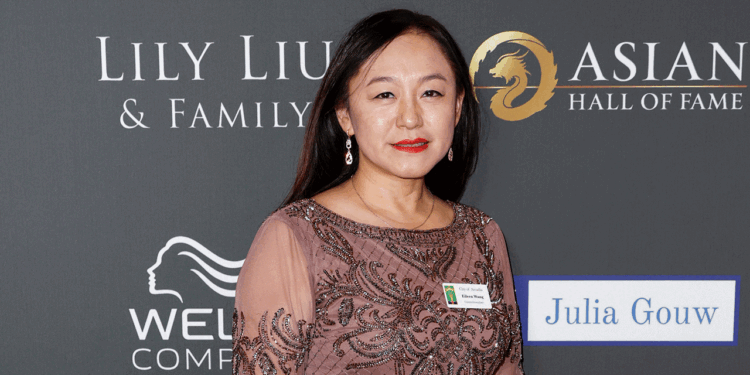 Eileen Wang, former mayor of Arcadia California stands and smiles at the 2023 Asian hall of fame induction ceremony.
