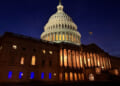 Blue lights honoring law enforcement officers can be seen shining out of Majority Whip Tom Emmers office in the U.S. Capitol in 2025.