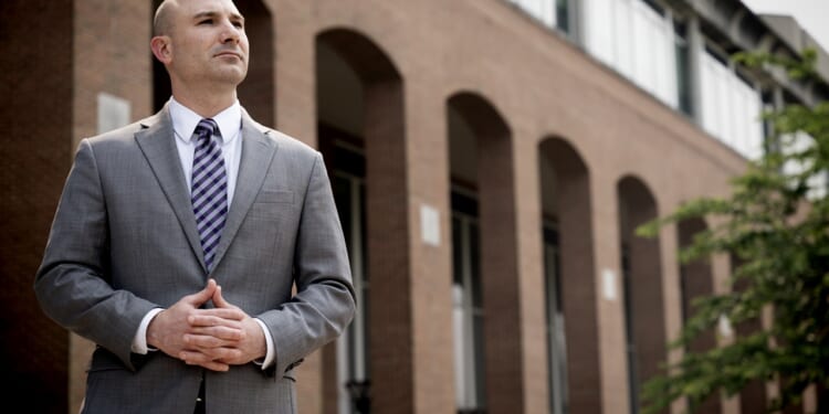 Steve Descano standing outside