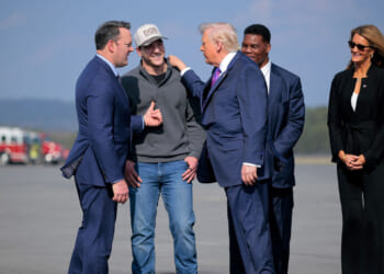 President Donald Trump greeting Burt Jones at Russell Regional Airport on February 19, 2026 in Rome, Georgia.