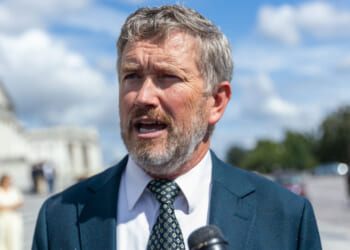 Thomas Massie speaks to reporters outside of the capitol.
