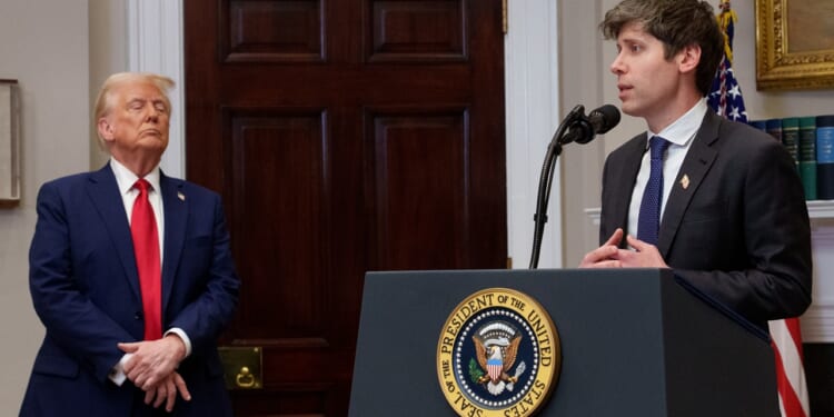 OpenAI CEO Sam Altman speaking at a podium in front of President Donald Trump