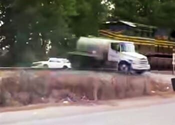 Train collides with septic truck in Chesapeake, Virginia (screenshot)