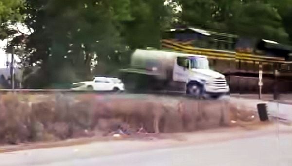 Train collides with septic truck in Chesapeake, Virginia (screenshot)