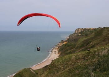 Sightseeing Plane Cuts Woman's Paragliding Lines Mid-Air, but She Lives to Tell the Tale – RedState