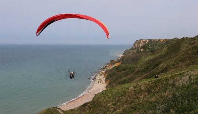 Sightseeing Plane Cuts Woman's Paragliding Lines Mid-Air, but She Lives to Tell the Tale – RedState