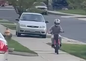 'This woman is crazy!' Watch enraged gal drive her car on sidewalk to run down young boy on dirt bike * WorldNetDaily * by Bob Unruh