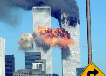 A fiery blasts rocks the World Trade Center after being hit by two planes September 11, 2001 in New York City.