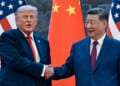 President Donald Trump (R) shakes hands with China's President Xi Jinping. (Kenny Holston/ AFP/Getty Images)