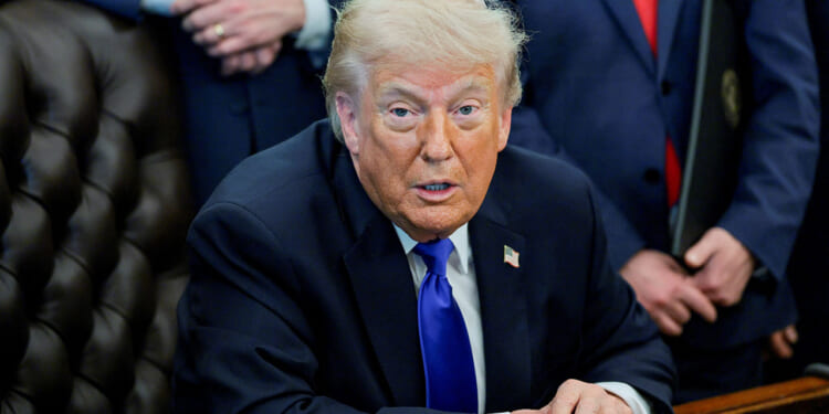 President Donald Trump takes questions from the media after signing an executive order in the Oval Office at the White House in Washington, D.C., U.S., April 30, 2026. REUTERS/Jonathan Ernst