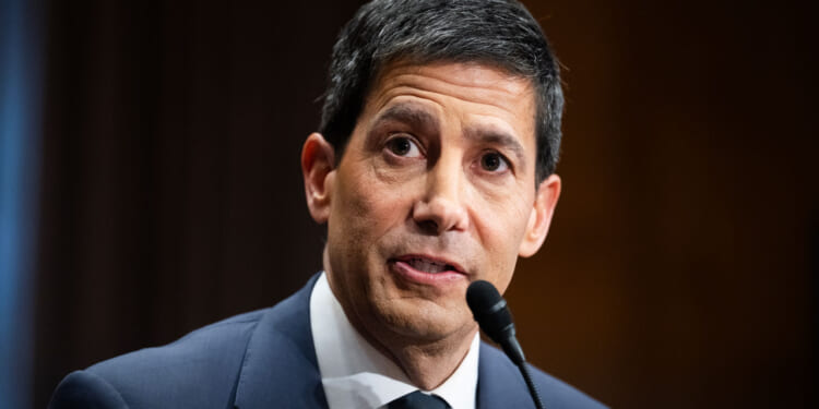Kevin Warsh speaks in the Senate banking committee.