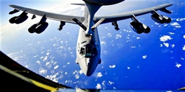 A U.S. Air Force B-52 Stratofortess receives fuel from a U.S. Air Force KC-135 Stratotanker assigned to the 506th Expeditionary Air Refueling Squadron over Andersen Air Force Base, Guam, Feb. 22, 2011. (U.S. Air Force photo)