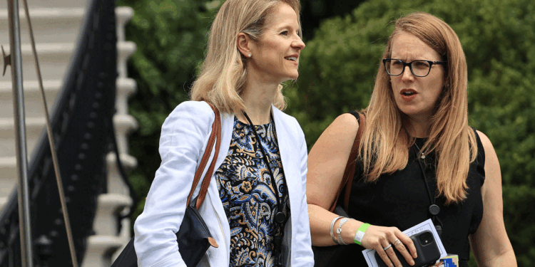 White House Counsel Dana Remus (L) and Deputy Chief of Staff Jennifer O'Malley Dillon depart the White House on July 13, 2021 in Washington, DC. Remus and Dillion are accompanying U.S. President Joe Biden as he travels to Philadelphia where he will deliver a speech about protecting the right to vote at the National Constitution Center. (Photo by Chip Somodevilla/Getty Images)