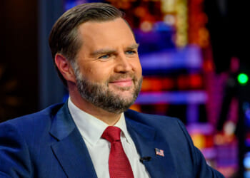 Close-up of a smiling JD Vance on the set of "Gutfeld!"