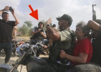 A photo surfaced of alleged free lance journalists embedded with Hamas terrorists during the Oct. 7 attack on Israel.