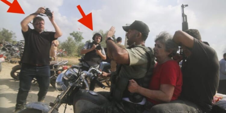 A photo surfaced of alleged free lance journalists embedded with Hamas terrorists during the Oct. 7 attack on Israel.