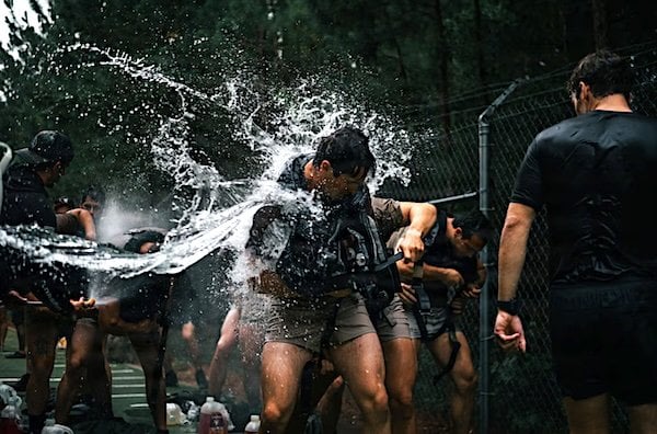 Soldiers assigned to the U.S. Army John F. Kennedy Special Warfare Center and School are exposed to stressful conditions while donning their gear during the Maritime Assessment Course at Fort Bragg, North Carolina, Friday, June 26, 2026. (U.S. Army photo by Staff Sgt. Landon Carter)