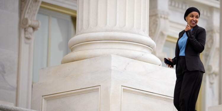 Ilhan Omar arrives for the last votes of the week at the U.S. Capitol Building.