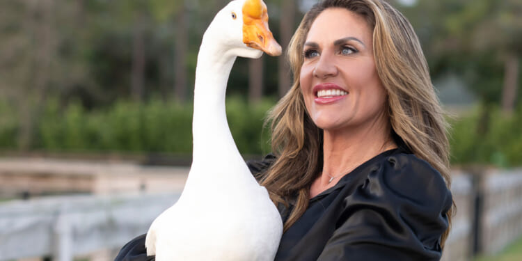 Florida State Representative and her rescue bird, Quacker.