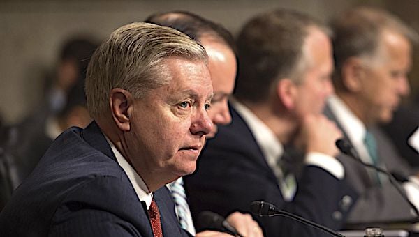 U.S. Sen. Lindsey Graham, R-S.C., left, listens as Defense Secretary Ash Carter testifies on the Defense Department's proposed fiscal year 2017 budget before the Senate Armed Services Committee in Washington, D.C., March 17, 2016. (DoD photo by Air Force Senior Master Sgt. Adrian Cadiz)