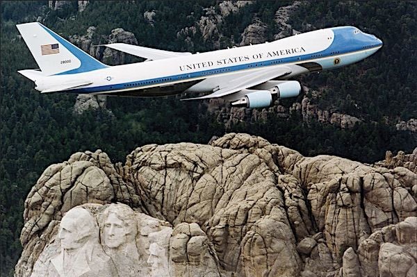 An Air Force VC-25 aircraft flies over Mount Rushmore, South Dakota, Wednesday, June 12, 2024. (U.S. Navy photo by Seaman Connor Engelmann)