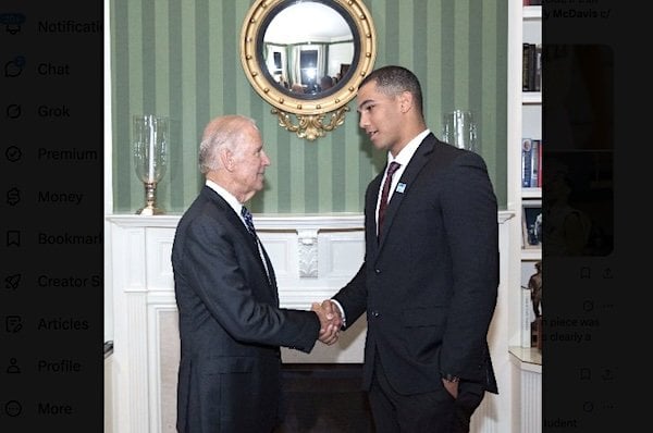 Joe Biden shaking hands with Cody McDavis