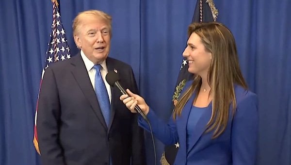President Donald Trump and Alexis McAdams of Fox News