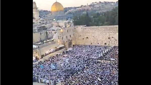Tens of thousands gather at the Western Wall for Jerusalem Day on Wednesday, June 5, 2024 (Video screenshot)